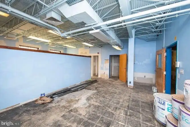 Versatile 6,000 Sq Ft Commercial Space in Prime Location with Parking Potential