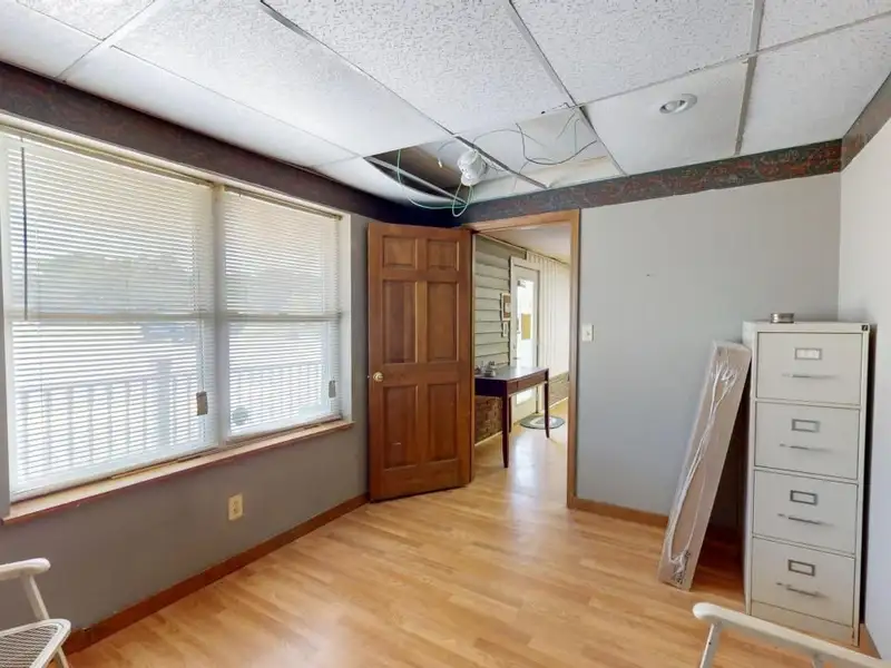Commercial Property on Busy Highway - 2.1 Acres, 31,000 Sq Ft with Offices and Roll-up Doors