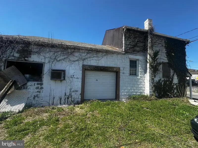 Large Commercial Building with Unique Floor Plan and Adjacent City-owned Lot for Sale