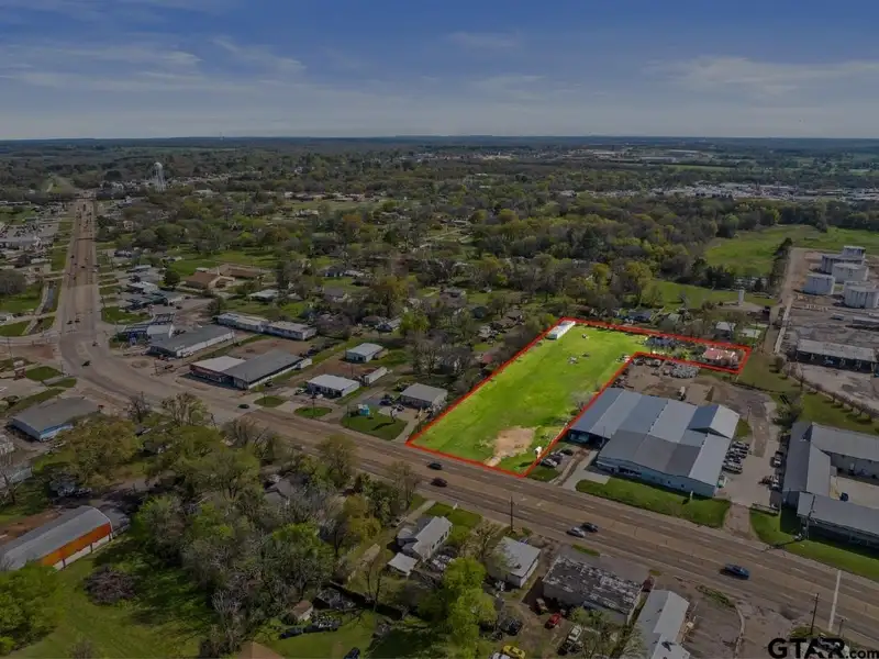 2-acre Commercial Property with Storage Units and Dual Road Frontage