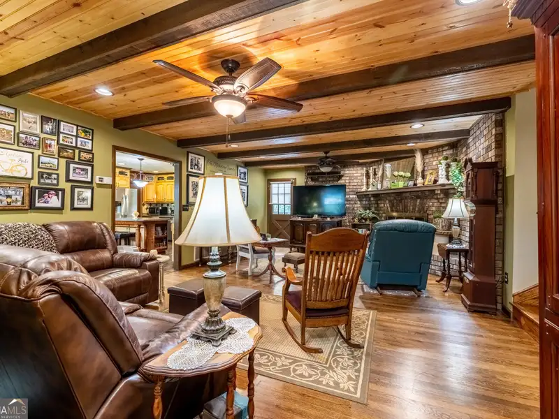 27 Acres with 2,400 Sq. Ft. Home, Duplexes, Pool, and Barn in Prime Location
