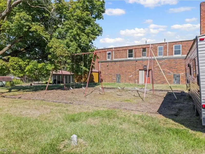 Versatile Two-story Brick Building on Almost 3 Acres with Gym and Classrooms