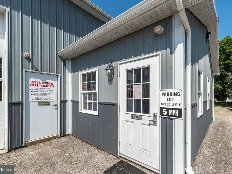 Auto Repair Shop with Residential Income Opportunity in Prime Location