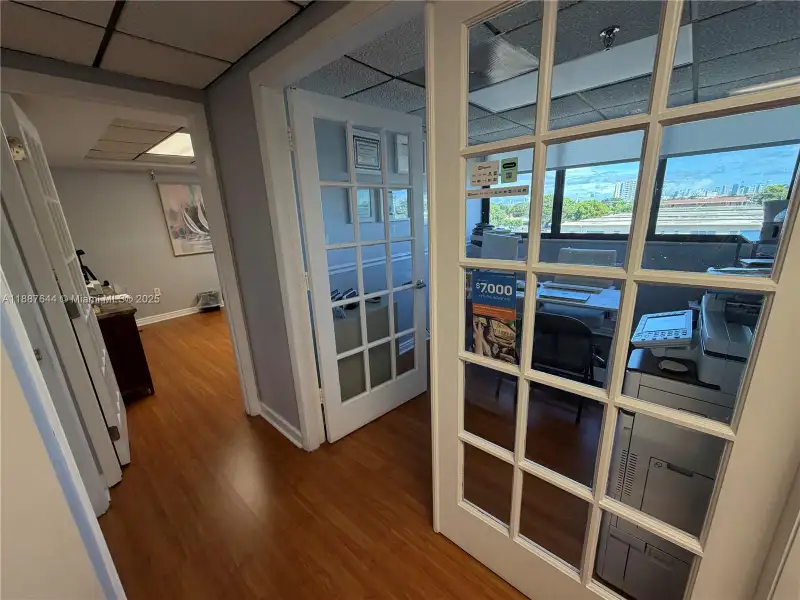 Well-maintained Office Space Near Coral Gables with Natural Light and Three Private Rooms