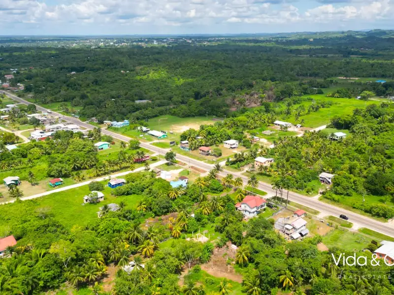 1-acre Lot for Sale in Camalote, Belmopan with Highway Frontage and Fenced Boundaries