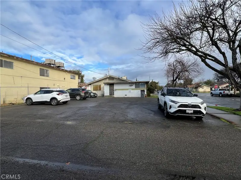 Versatile Office Space on Corner Lot with Ample Parking in Prime Location