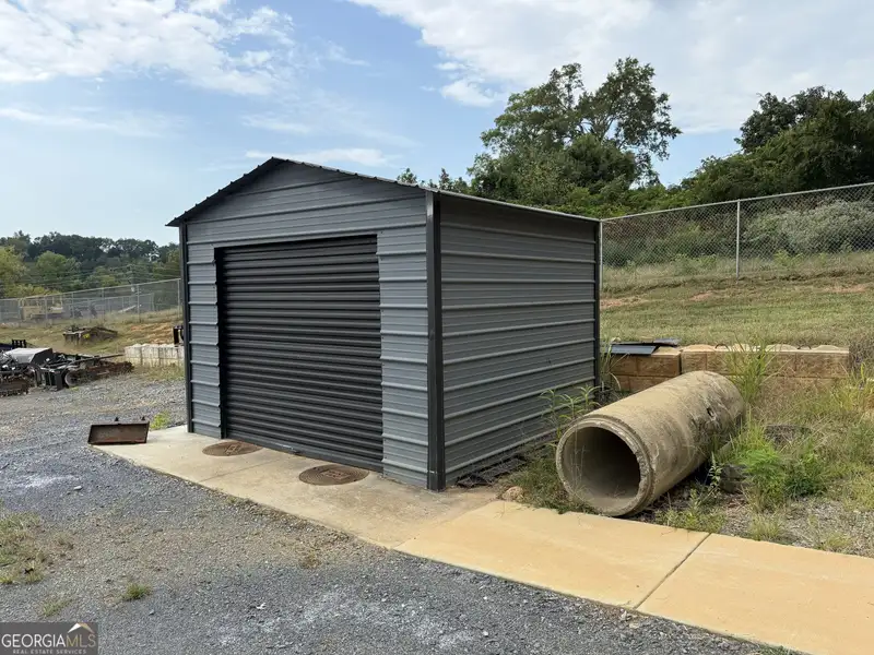 Versatile 8,000 Sf Industrial Facility on 5 Acres with Prime Hwy 41 Frontage