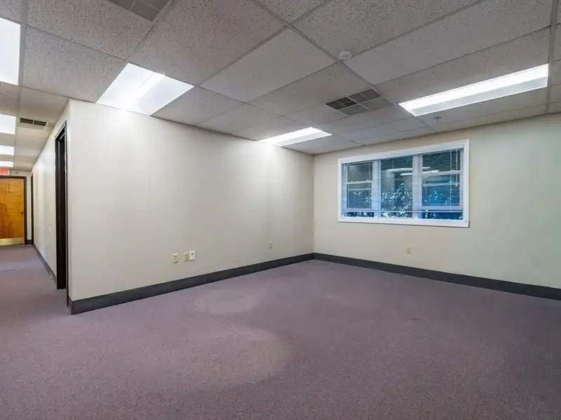 Freestanding Four-story Office Building with Parking on Route 114, North Andover