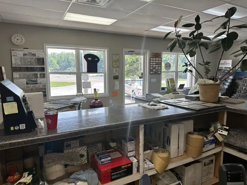 Large Commercial Building on Highway 412e in Parsons with Extensive Frontage and Warehouse Space