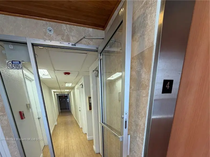 Well-maintained Office Space Near Coral Gables with Natural Light and Three Private Rooms
