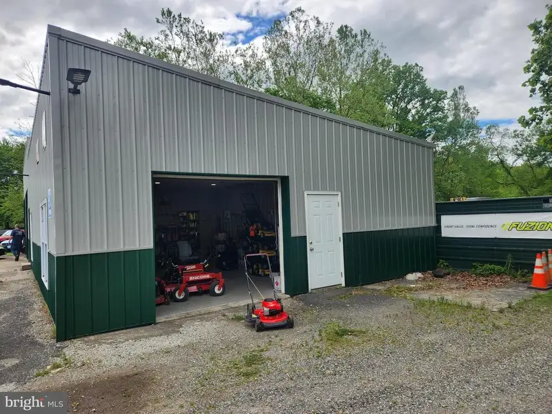 Versatile 9-acre Property with Salvage Yard, Auto Repair Shop, and Approved Car Sales Lot