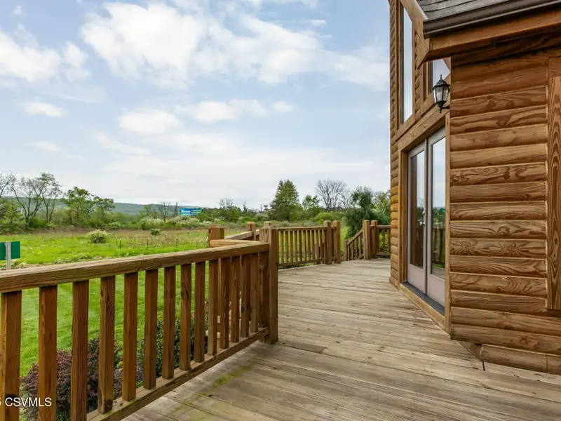 Commercial Log Home on 2 Acres with 3 Bedrooms and Scenic Views