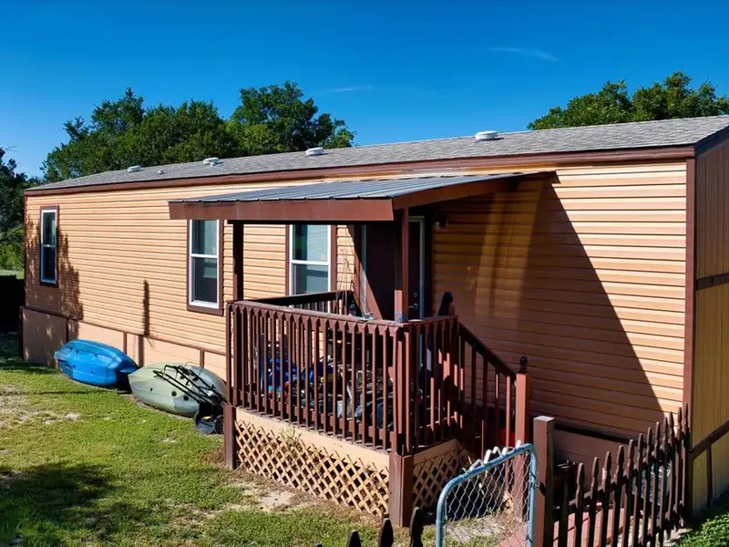 10-acre Mobile Home Community with 5 Units, Fenced, Workshop, and Growth Potential