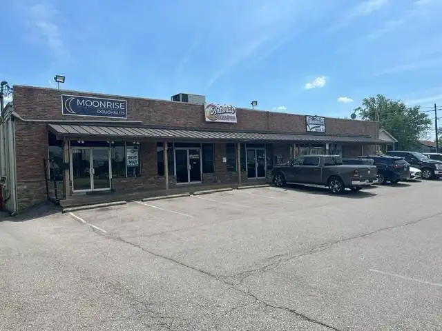 Turnkey 1,600 Sq Ft Retail Space with Kitchen Hood and Ample Parking in Prime Location