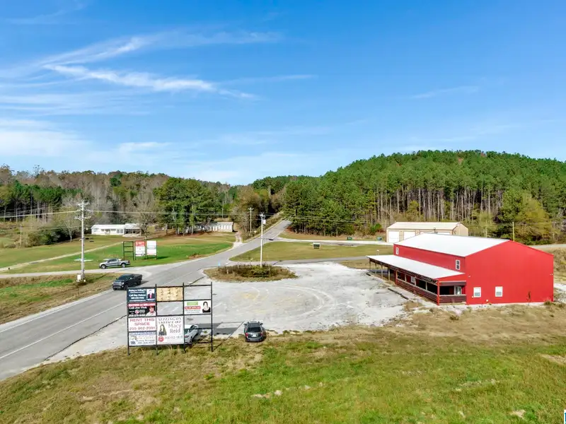 Prime Commercial Property Near Smith Lake with 3,800 Sq Ft Building and Billboard Income