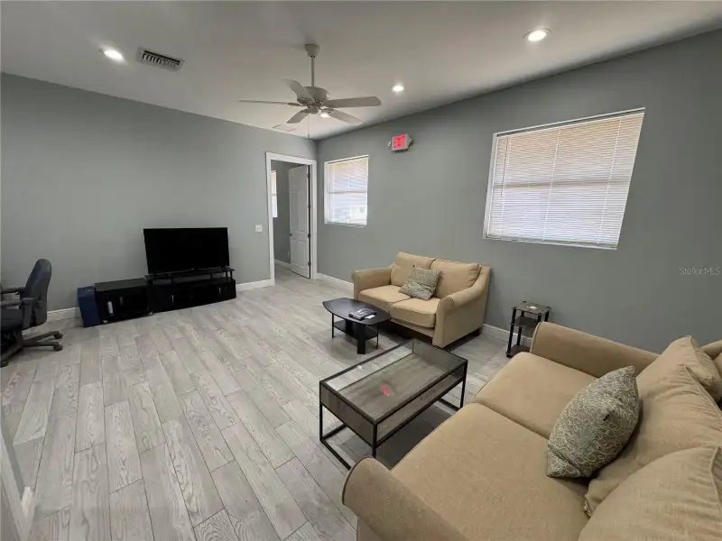 Industrial Property for Sale in Clearwater: Two Buildings with Office Space and Garage Access