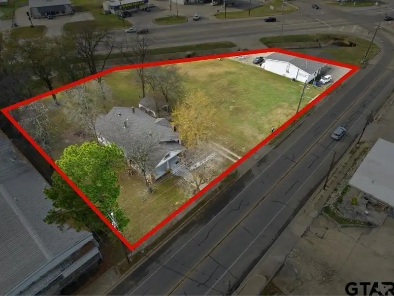 Prime Commercial Property with Building and Home on Half Acre Lot