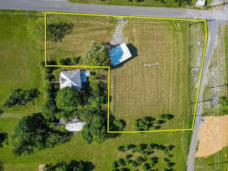Classic American Foursquare Home in Need of Restoration with Detached Garage