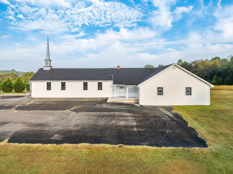 Historic Former Methodist Church in Mcminn County with Stained Glass and Southern Charm