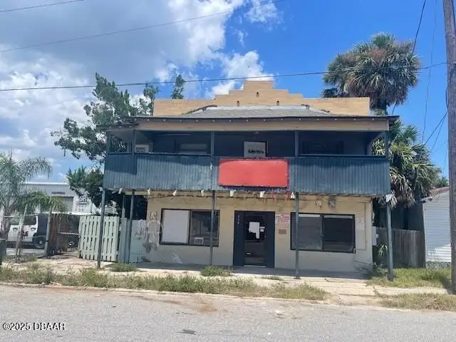 Multi-parcel Offering: Two-story Building with Renovation Potential in Prime Location
