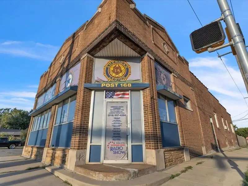 Versatile Corner Commercial Property with Retail Space and Two Apartments in Prime Location