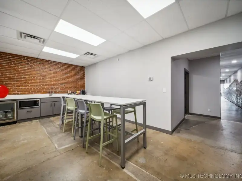 Historic Office Building with 9 Private Suites and Conference Room in Prime Location