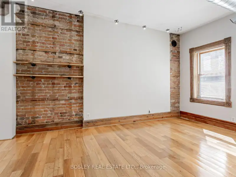 Charming Two-storey Apartment in Landmark Building on Queen St West