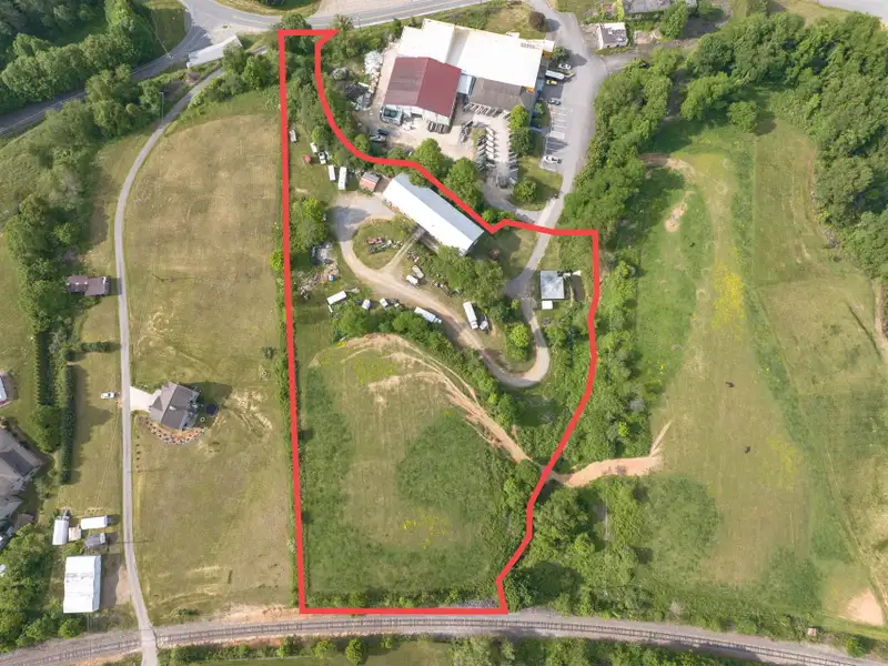 Historic 1918 Stone Building with 3.99 Acres and Detached Workshop in Balsam Road Area