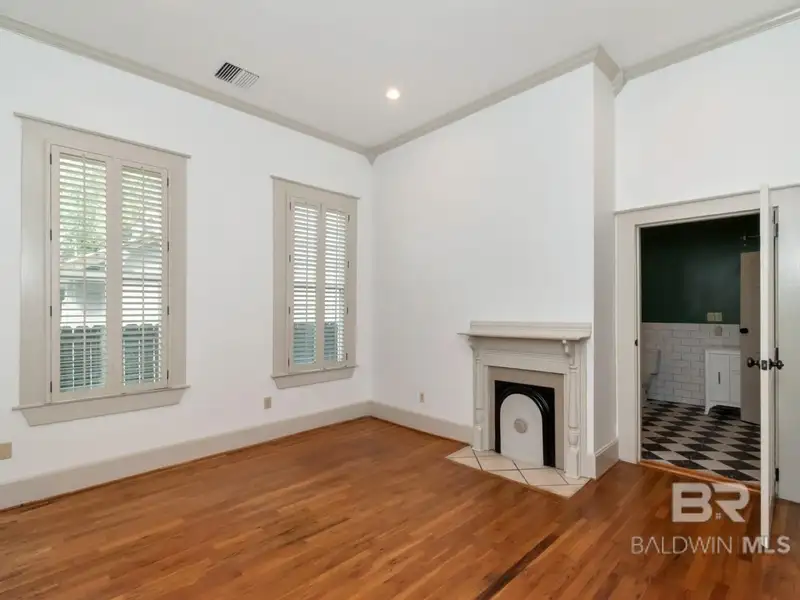 Mixed-use Property in Downtown Mobile, Alabama with High Ceilings and Hardwood Floors