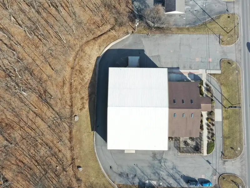 Versatile Commercial Property with Showroom, Offices, and Large Metal Building in Prime Location