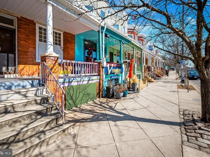 Multi-story Mixed-use Property with Apartment Potential in Prime Location
