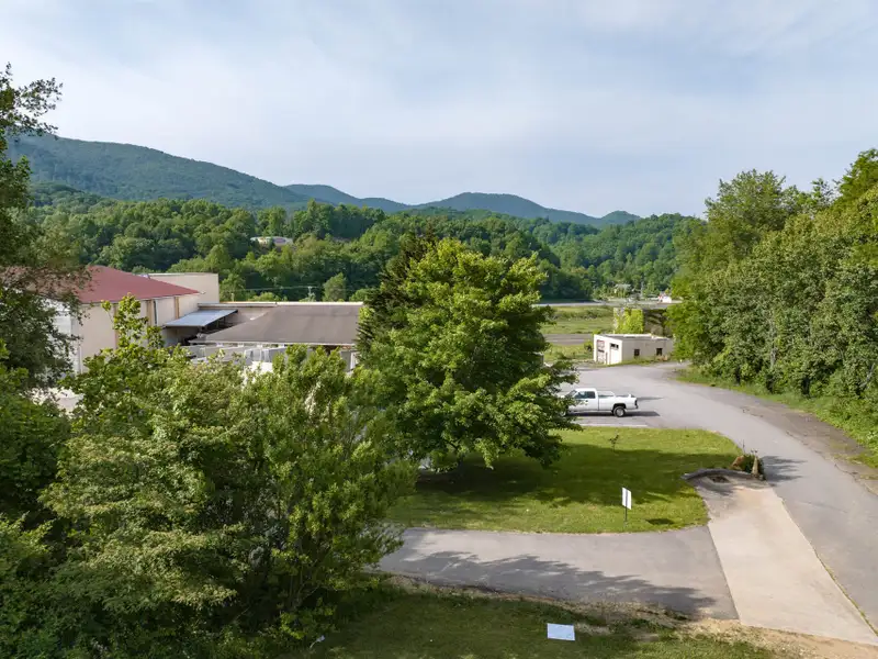 Historic 1918 Stone Building with 3.99 Acres and Detached Workshop in Balsam Road Area