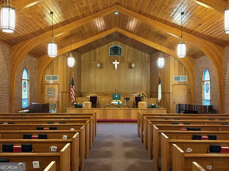Multi-use Church Property with Sanctuary, Classrooms, Fellowship Hall, and Ample Parking