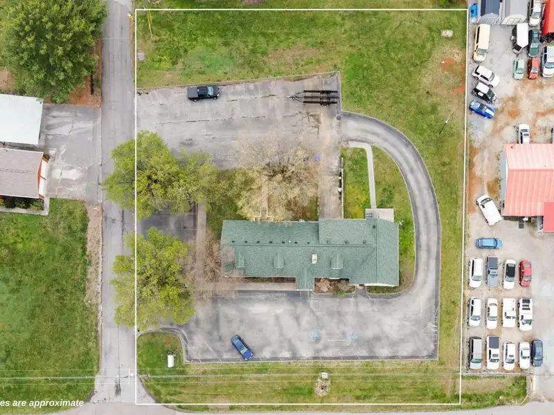 Versatile 4,305 Sq Ft Office Building with Apartment on Highway 11e