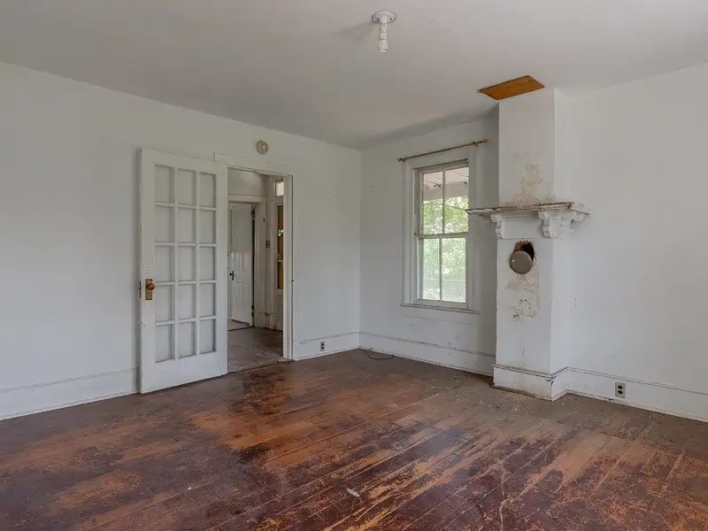 Classic American Foursquare Home in Need of Restoration with Detached Garage