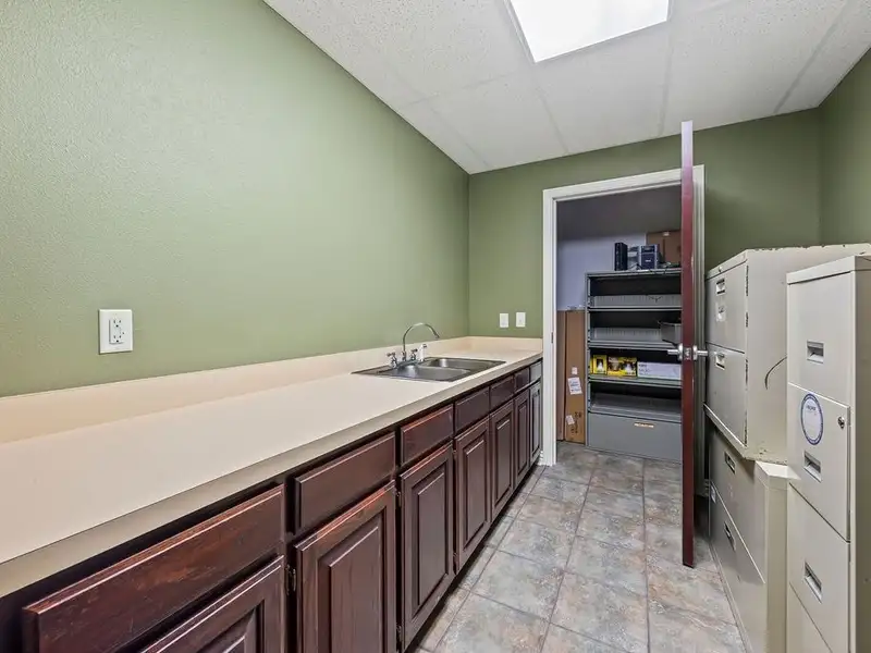 Versatile 2,752 Sq Ft Office Building in Central Rogers with Five Private Offices