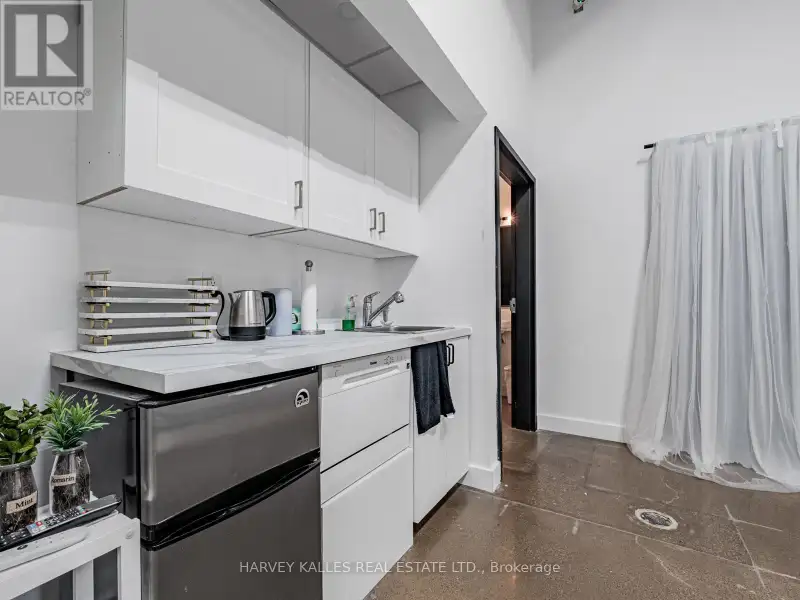 Fully Leased Commercial Condo in Prime Location on the Queensway