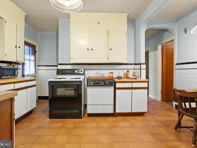 Charming 3-bedroom Single Family Home with Detached Garage and Bar in Folcroft