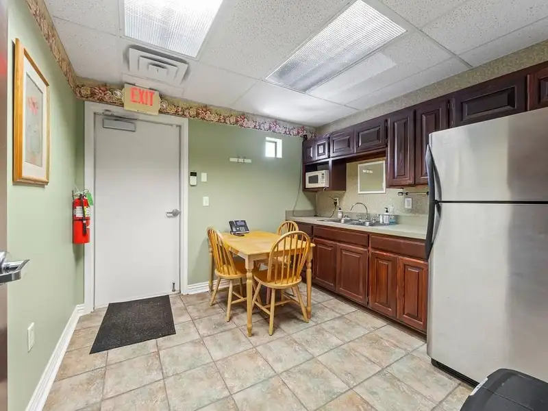 Versatile 2,752 Sq Ft Office Building in Central Rogers with Five Private Offices