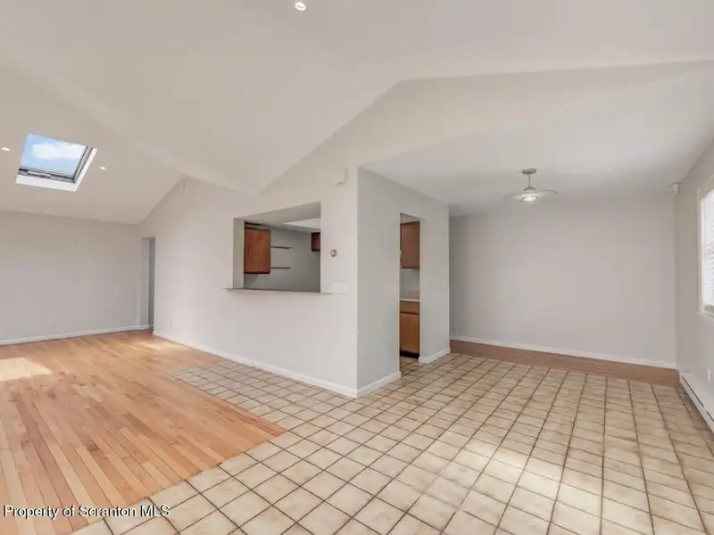 Mixed-use Property in Throop: 7-bay Garage and Updated 2-bedroom Apartment