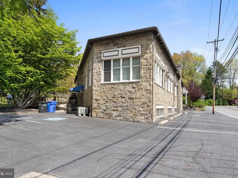 Historic 1921 Office Building in Wallingford with Ample Parking and Strong Investment Potential