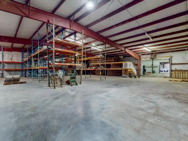 Commercial Property on Busy Highway - 2.1 Acres, 31,000 Sq Ft with Offices and Roll-up Doors
