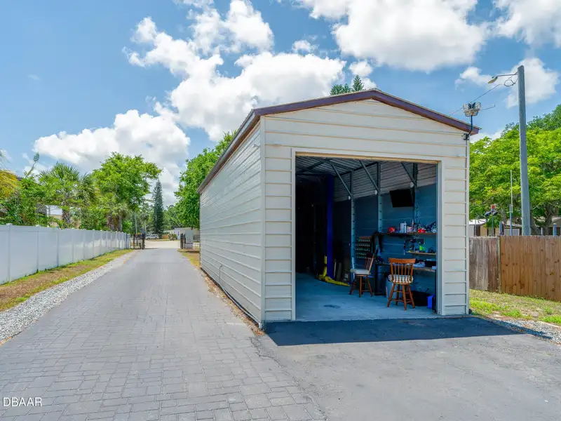 Mixed Use Property: Light Industrial Lot with Adjoining Residential Home and Expansion Potential