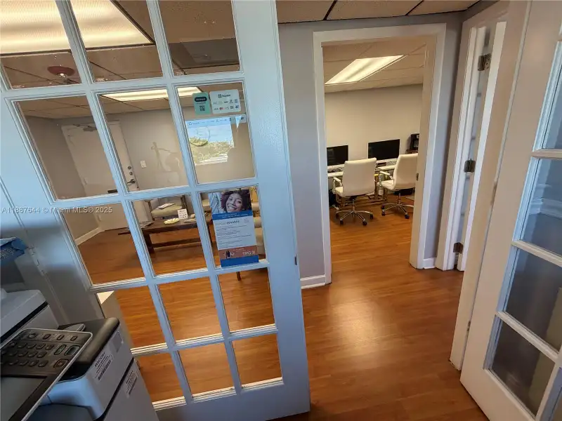 Well-maintained Office Space Near Coral Gables with Natural Light and Three Private Rooms