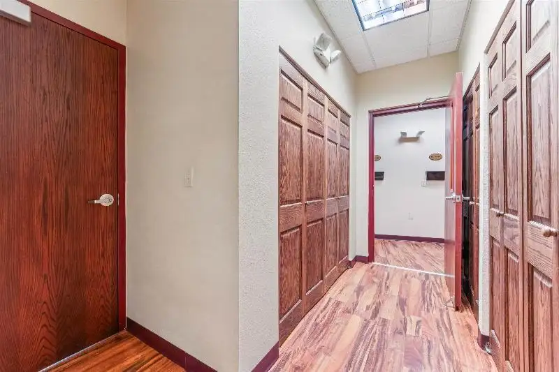 Versatile Commercial Condo for Sale Near Hwy 151 & 41 with Multiple Offices and Amenities