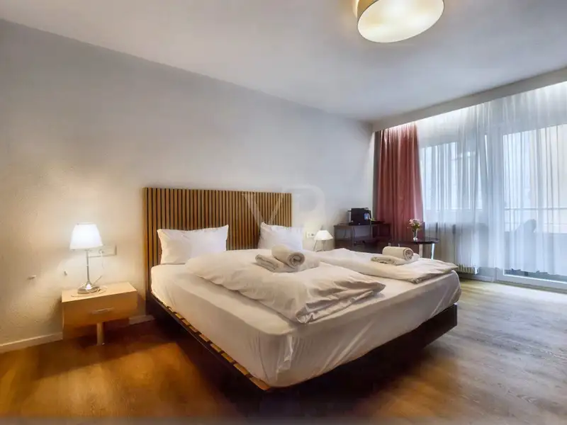 Historic Family-run Hotel in Ansbach with Restaurant, Guest Rooms, and Green Energy Features