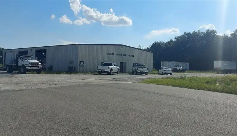10.94 Acres with 7,500 Sq Ft Warehouse on High-visibility State Rd 46 Frontage