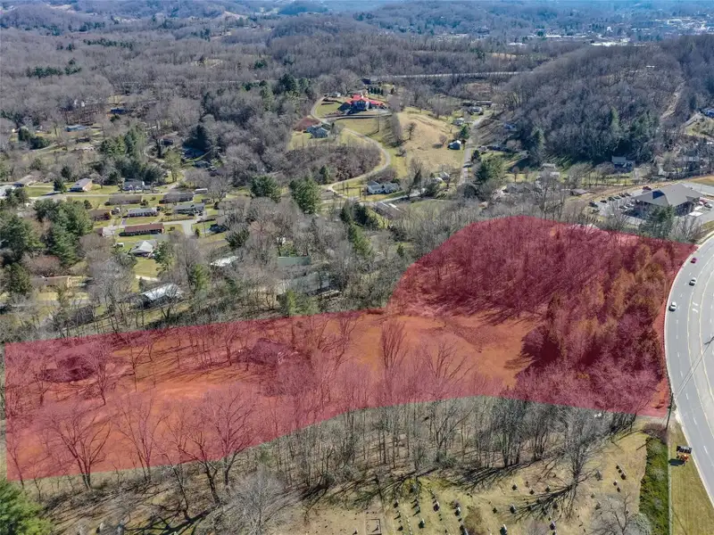 9.29 Acre Multi-family or Commercial Parcel in Waynesville Etj with City Utilities