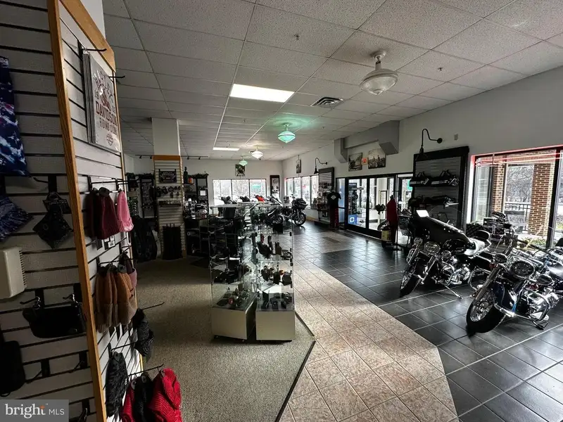 Versatile Commercial Property with Showroom, Offices, and Large Metal Building in Prime Location