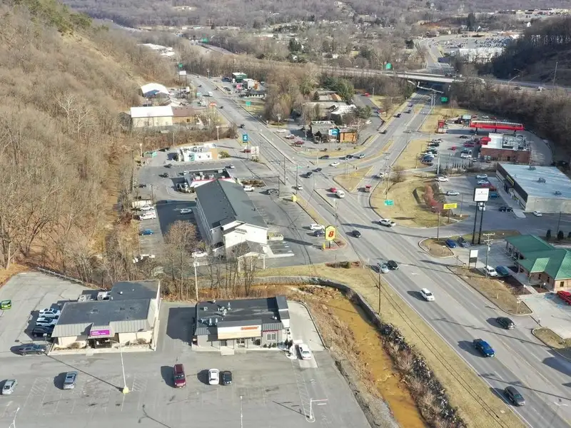 Versatile Commercial Property with Showroom, Offices, and Large Metal Building in Prime Location